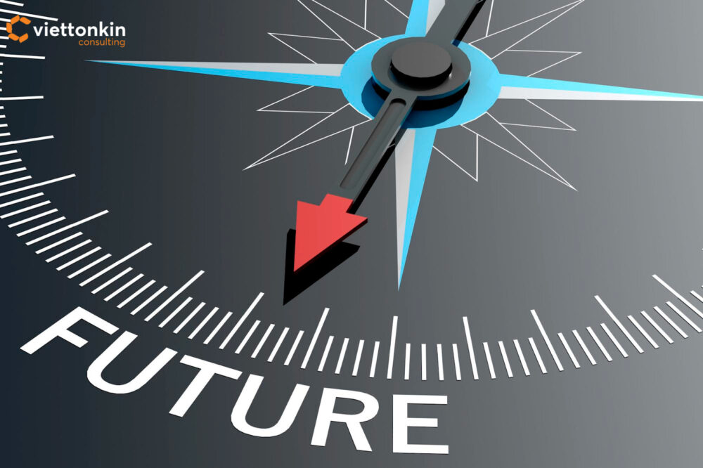 Close-up of a compass needle pointing toward the word ‘FUTURE,’ symbolizing Vietnam’s startup ecosystem moving toward a clear and promising direction.