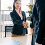 Business handshake Vietnam office