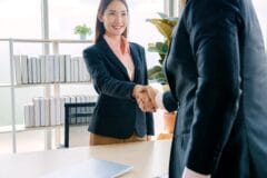 Business handshake Vietnam office