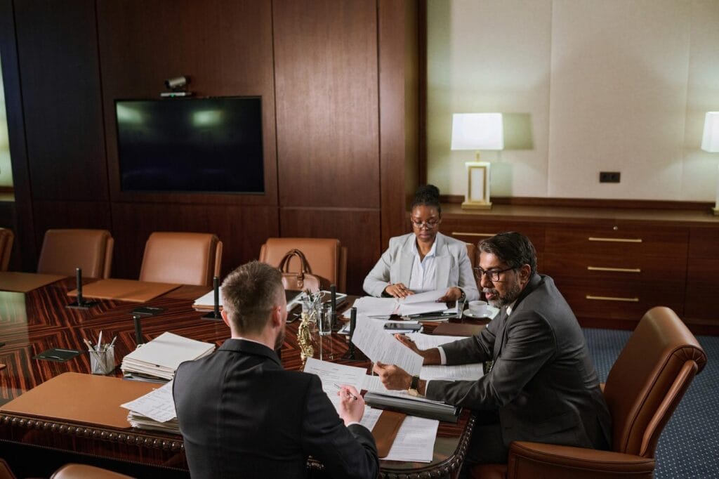 Arbitration meeting room lawyers for cross-border FDI agreements