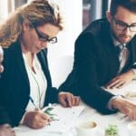 Finance team assessing corporate income tax exemption eligibility under Decree 20