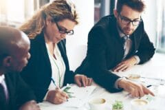 Finance team assessing corporate income tax exemption eligibility under Decree 20